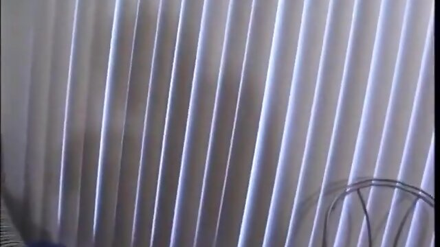 He licks the tip of her prick