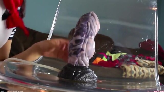 Pretty She-Male Rides Monster Dildos