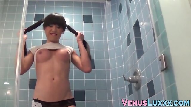 Oriental tgirl gets wet for masturbation shower and cumshot