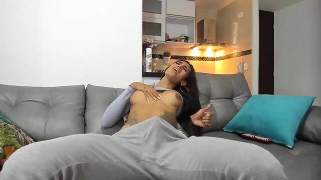 Young Babe with Big Tits and Big Cock Masturbates Solo on Webcam