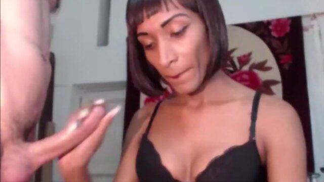 Black tranny and her lover jerking off each other