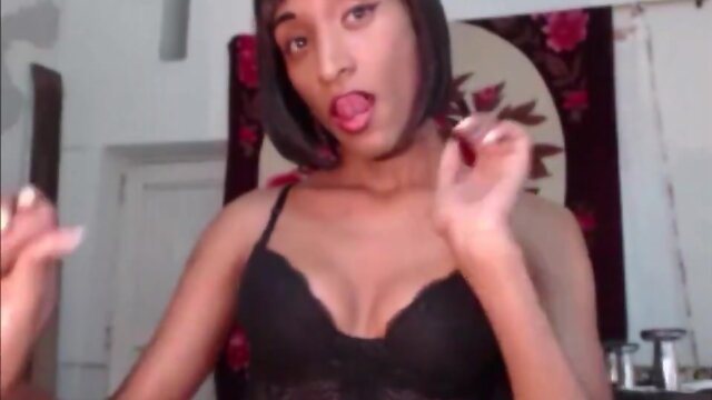 Black tranny and her lover jerking off each other