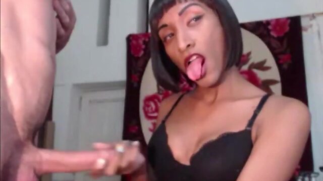 Black tranny and her lover jerking off each other