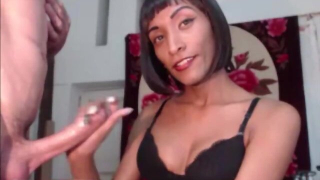 Black tranny and her lover jerking off each other