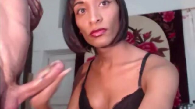 Black tranny and her lover jerking off each other
