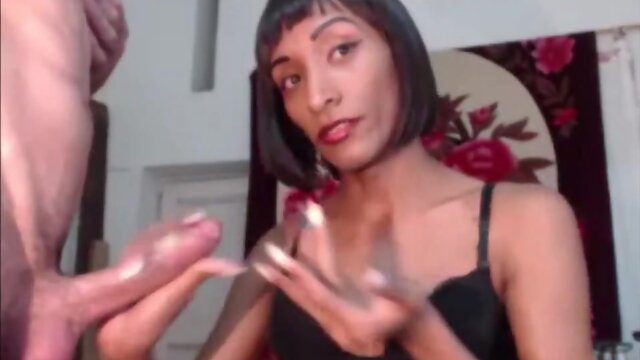 Black tranny and her lover jerking off each other