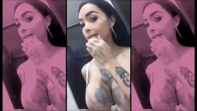 Sensual Busty Tattoo’d Shemale