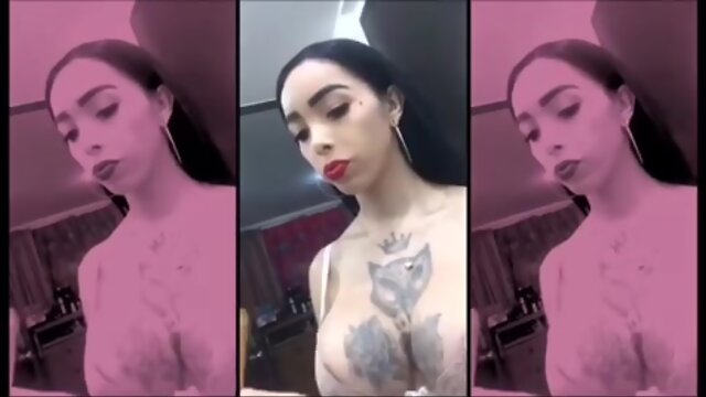 Sensual Busty Tattoo’d Shemale