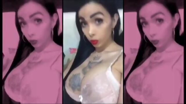 Sensual Busty Tattoo’d Shemale