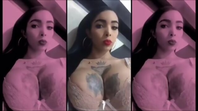 Sensual Busty Tattoo’d Shemale