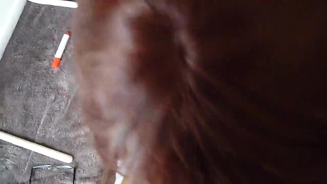 Sissy dressed as schoolgirl