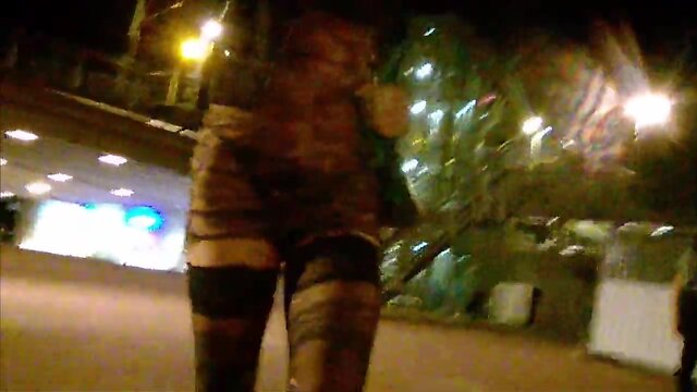 Public exhibitionist dressed very short transparent