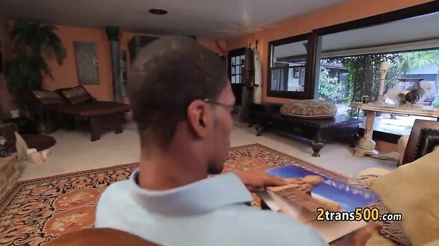 Transsexual milf takes ebony schlong