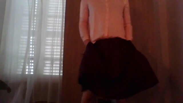 Pretty schoolgirl CD in silk back home for some fun