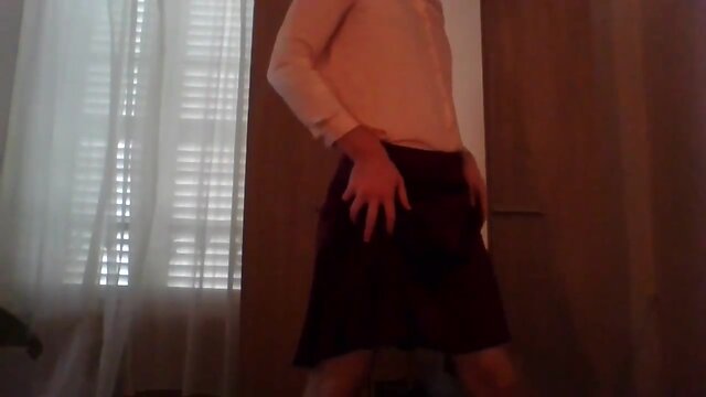 Pretty schoolgirl CD in silk back home for some fun