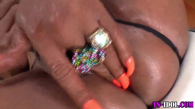 Ebony transsexual with massive schlong tugs