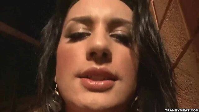 Here is a sexy huge tit shemale who is wanking off