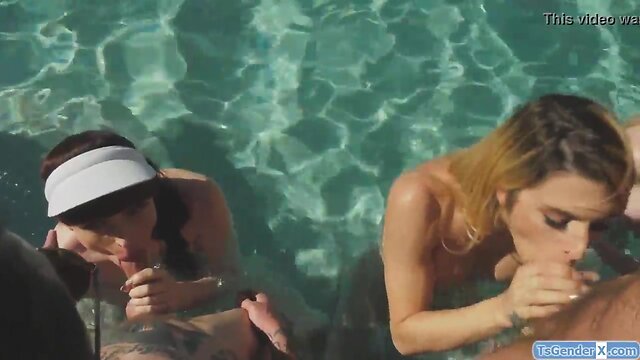 Ladyboys and guys have a pool party debauch