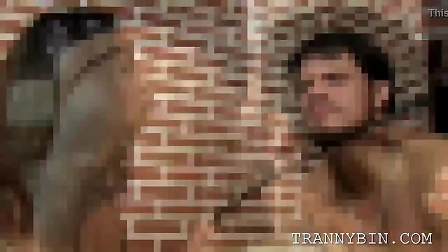 She-Male smokes a cigar and gets a cocksucking