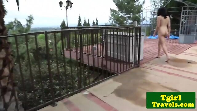 Chesty shemale masturbating in the bathtub