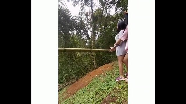 Two lesbian t-girls by the cascade outdoors making love