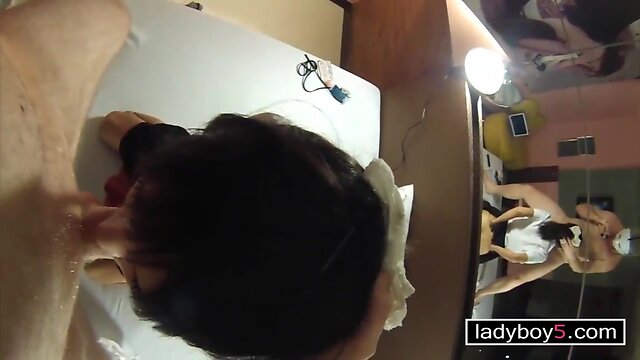 Young transsexual with a medical mask drilled in the butt