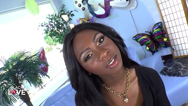 Pretty ebony teenager with a huge surprise