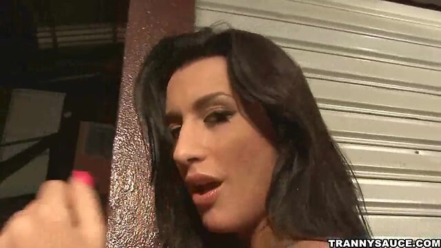 Latin ladyboy tugging on her hard pecker outdoors