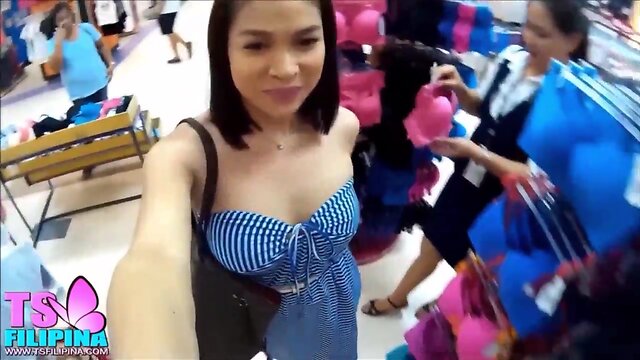 She-Male filipina showing her boobs in the mall fitting room
