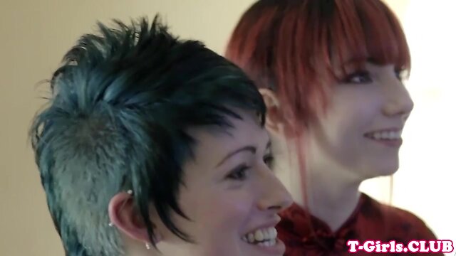 Inked transgirl straponfucked by redhead babe