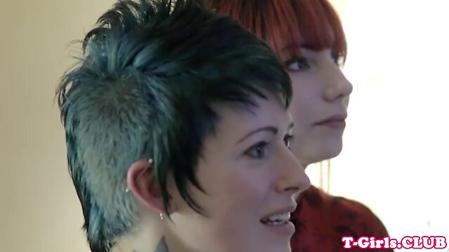 Inked transgirl straponfucked by redhead babe