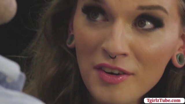 Shemale jenna sucks a bigcock in the gloryhole