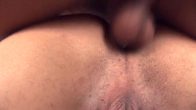 Sultry & tanned transsexual with red stockings anal banged