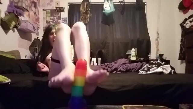 Trans baby gives sextoy footjob