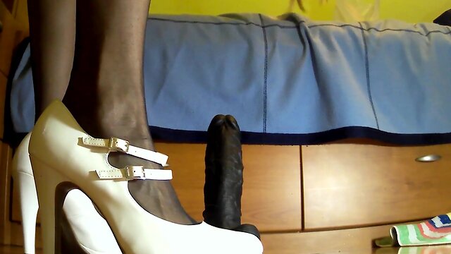 Blond sexy crossdresser inserting a massive ebony sextoy. double cum shot!