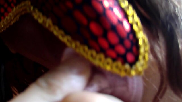 Close-up of alien sextoy eating and thong stroking off