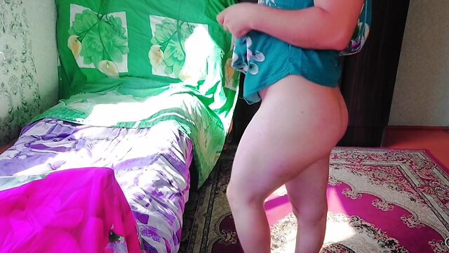 Sassy tranny CD in green mini dress with massive butt