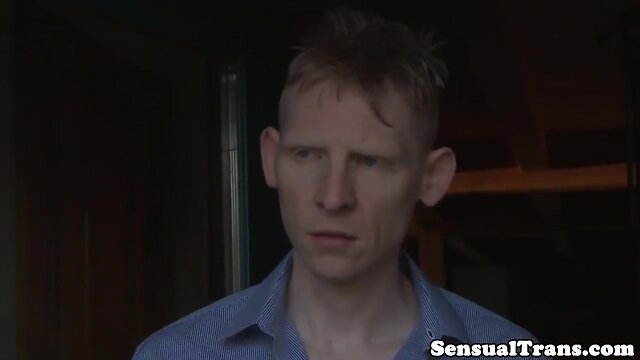 Redhead transwoman receives anal stimulation while masturbating.