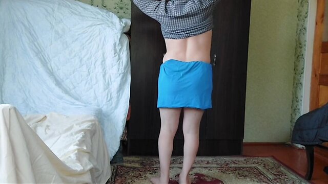 Boy to tranny transformation: blue skirt and white legs