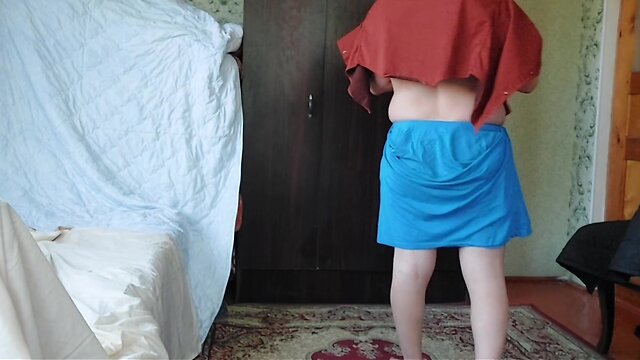 Boy to tranny transformation: blue skirt and white legs