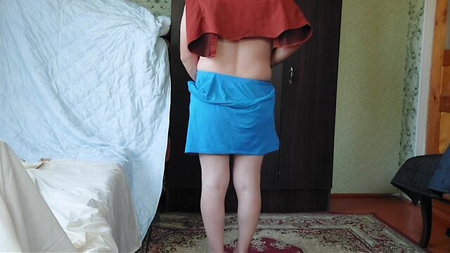 Boy to tranny transformation: blue skirt and white legs