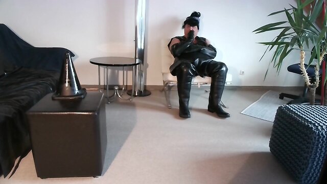 Latex dress, condom, rubber boot, and sextoy play enjoyment