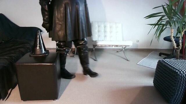 Latex dress, condom, rubber boot, and sextoy play enjoyment