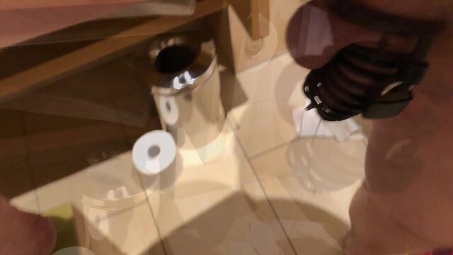 Sissy attempts cumshot in chastity cage