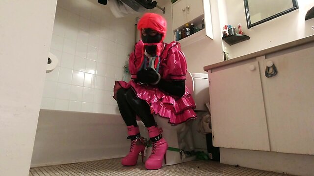 Bathroom bondage: crossdresser maids locked to toilet