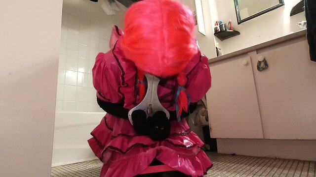 Bathroom bondage: crossdresser maids locked to toilet