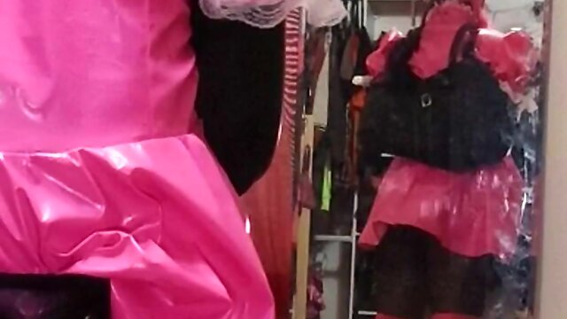 Self-bondage CD maid with a spiked chastity cage