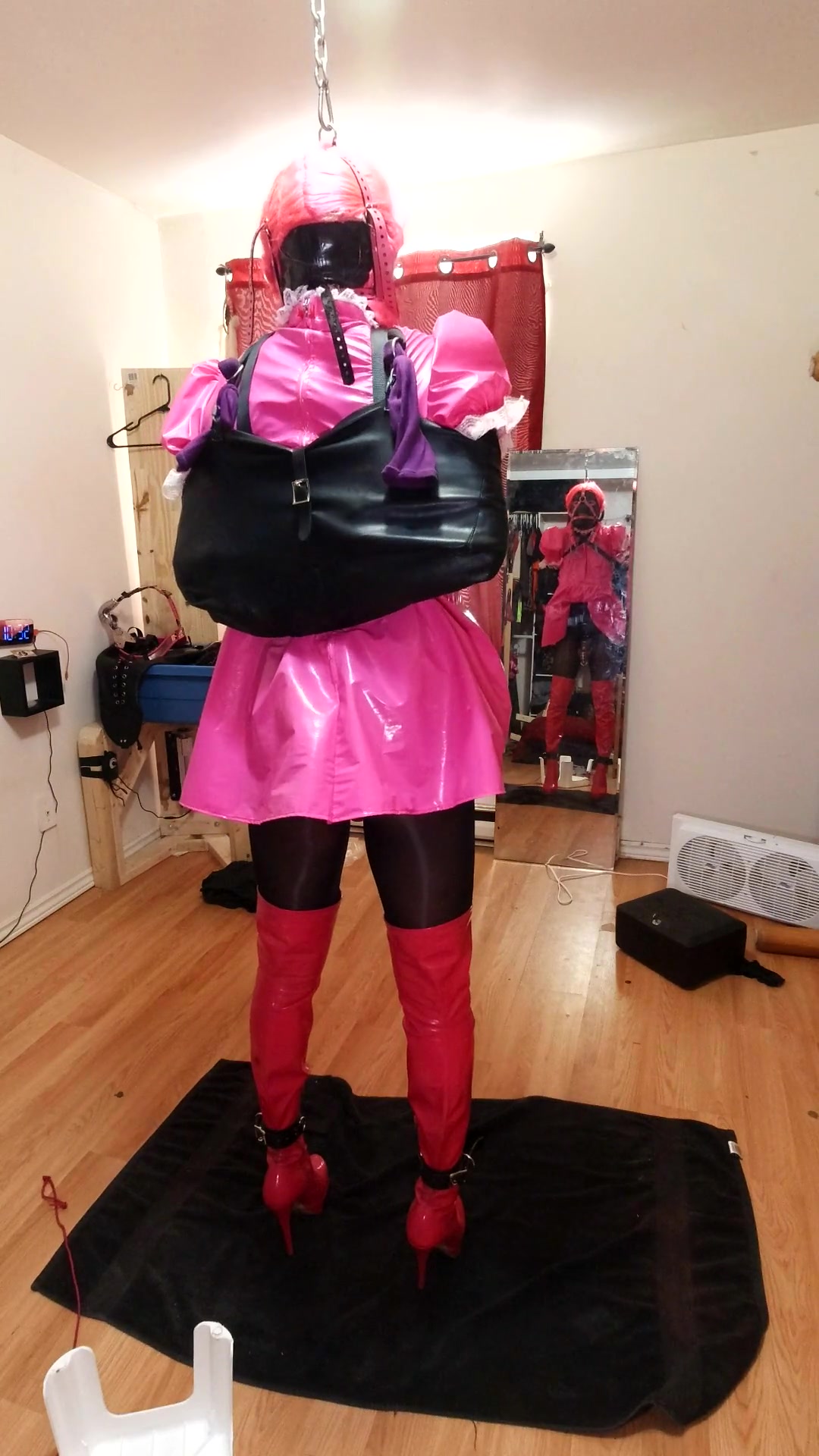 Self-bondage CD maid with a spiked chastity cage