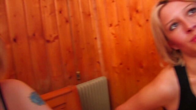 Shared husband: blonde with piercing and stockings.