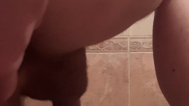 Crossdressing bathroom self-pleasure